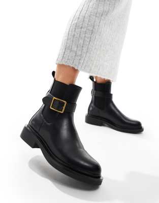 ASOS DESIGN - Aurora - Flache Stiefel in Schwarz mit Schnallenriemen