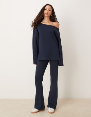 ASOS DESIGN - Ausgestellte Jogginghose aus Interlock-Stoff in Marineblau, Kombiteil