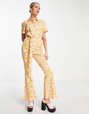 ASOS DESIGN - Ausgestellter Twill-Overall im Stil der 70er mit Blumenmuster-Bunt