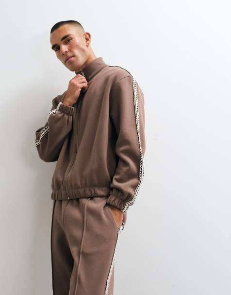 ASOS DESIGN avslappnad boxig jerseyjacka med dragkedja och vävd tejp i brun - view 1
