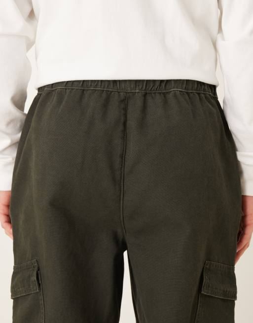 ASOS DESIGN – Avsmalnande cargobyxor i svavelfärgat tyg och dra på-modell, 4 av 5