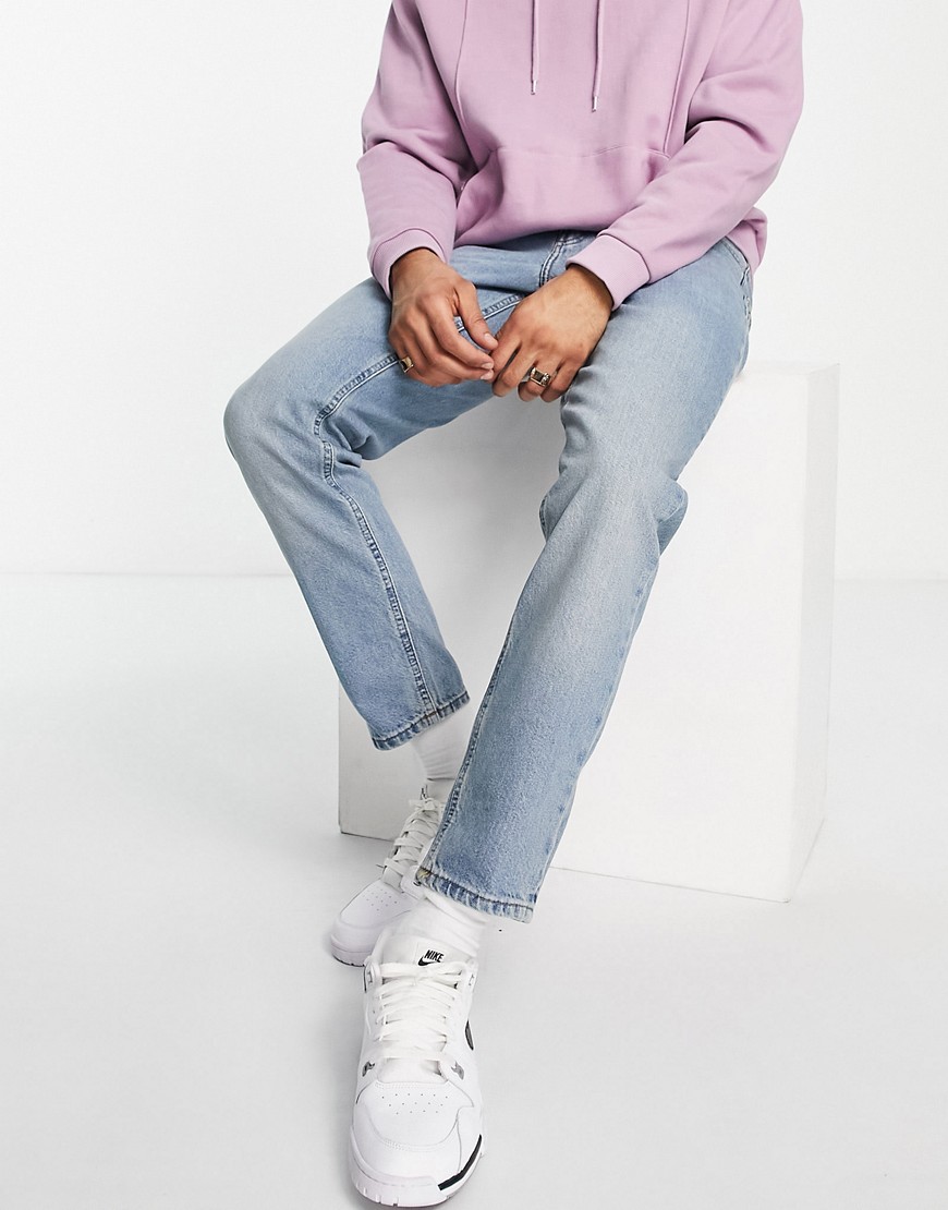 ASOS DESIGN – Avsmalnande jeans i Dusty-tvätt-Blå