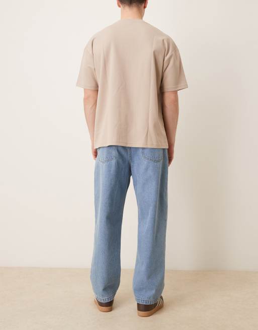 ASOS DESIGN – Avsmalnande jeans i ljus tvätt med avslappnad passform, 2 av 5