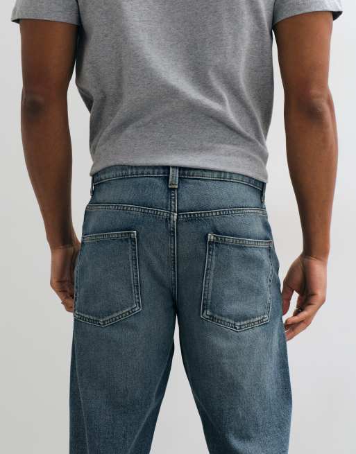 ASOS DESIGN avsmalnande jeans i mörkblå tvätt, 5 av 5