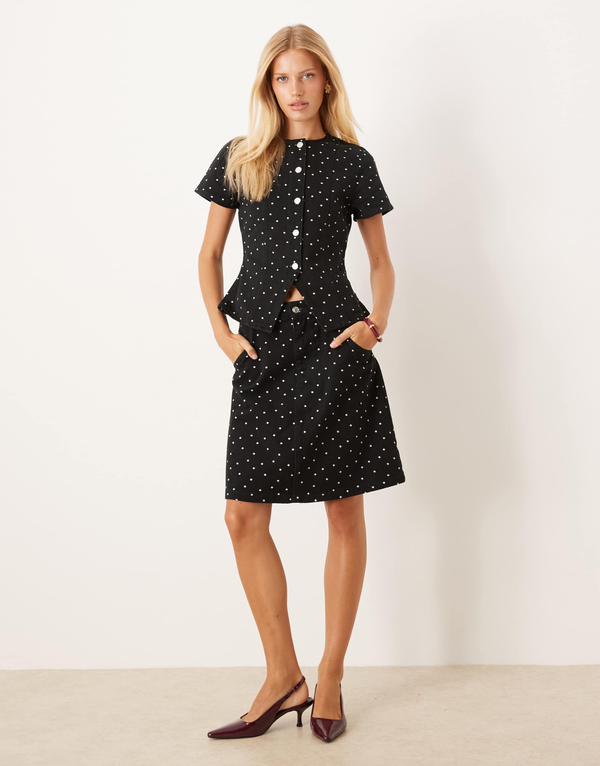asos design awkward length denim skirt with mini polka dots