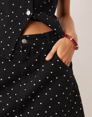 Asos Design Awkward Length Denim Skirt With Mini Polka Dots-black In Black