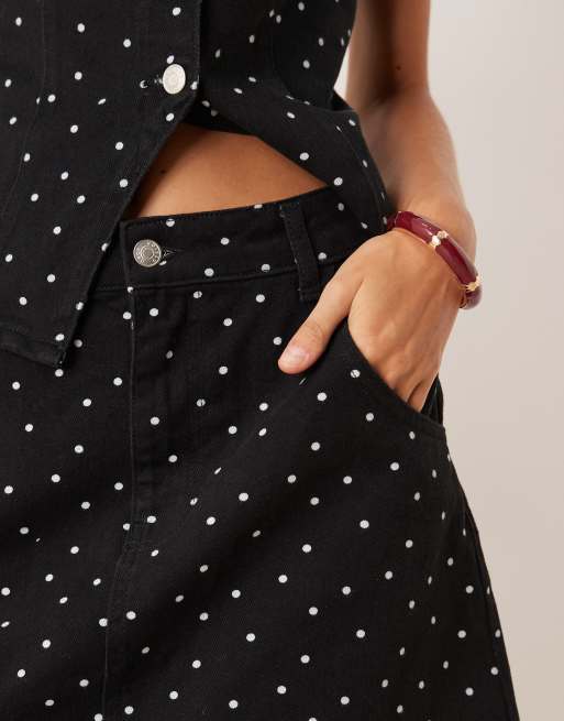 ASOS DESIGN awkward length denim skirt with mini polka dots