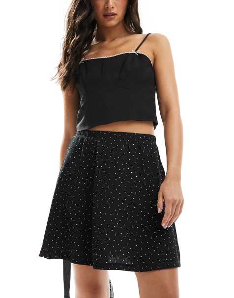 ASOS DESIGN awkward length midi skirt in black polka dot - view 1