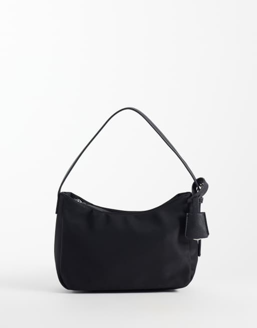 ASOS DESIGN axelväska i nylon med avtagbar nyckelberlock i svart, 1 av 4