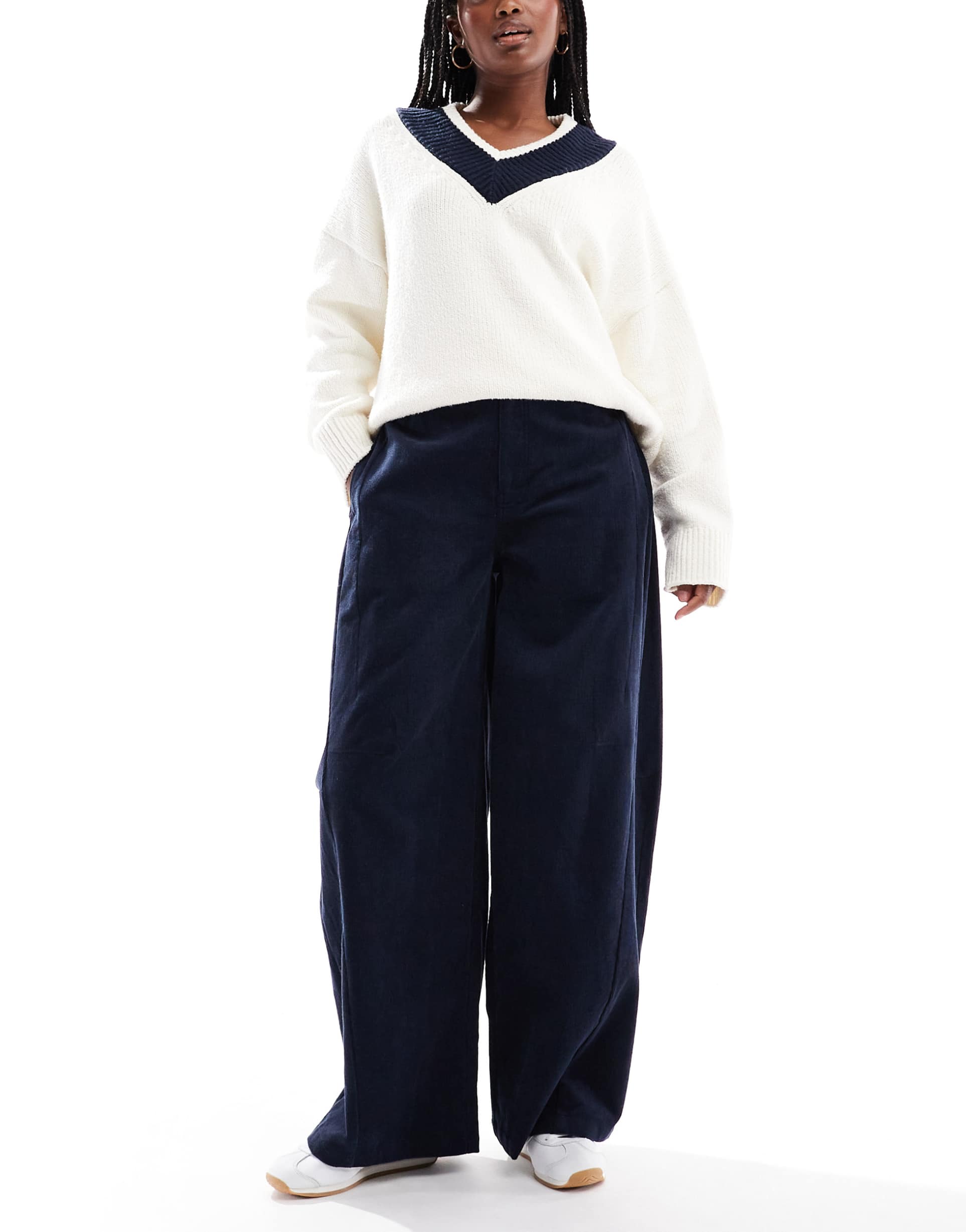 asos design baby cord extreme horseshoe pants with seam detail in navy