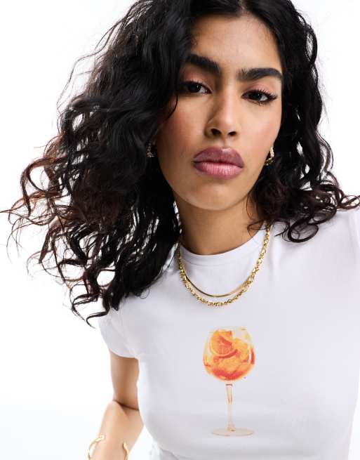 ASOS DESIGN - Baby-t-shirt i elfenbensfarve med drinksgrafik