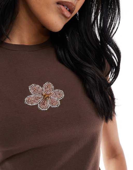 ASOS DESIGN baby tee with beaded floral graphic in brown