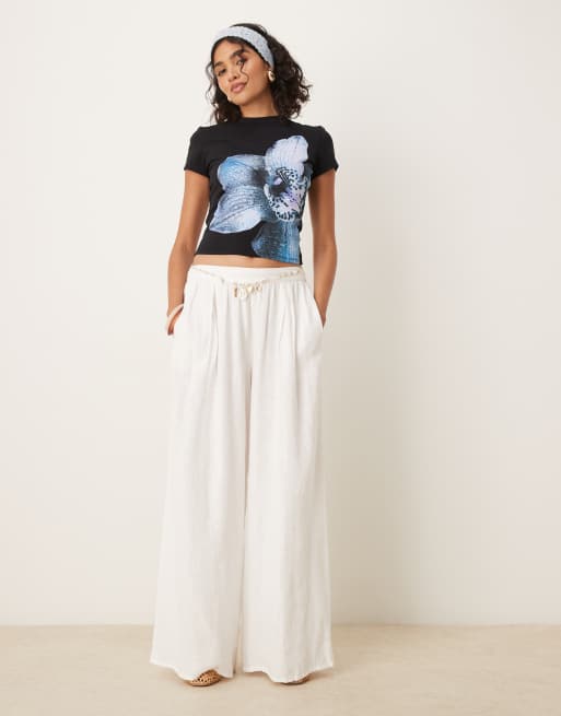 ASOS DESIGN baby tee with blue floral graphic in black