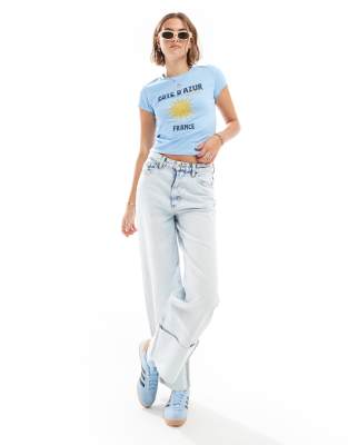Shop ASOS DESIGN baby tee with cote d'azur graphic in blue Online – Trendy & Affordable Fashion