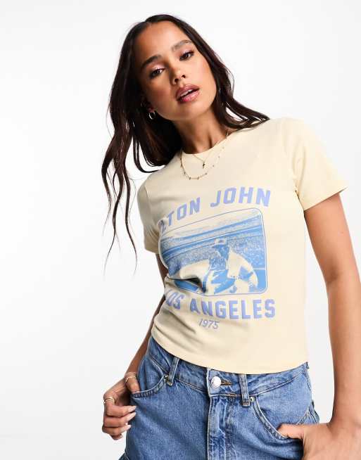 ASOS DESIGN baby tee with Elton John licence graphic in cream