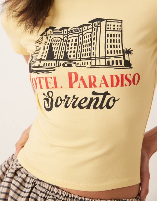 ASOS DESIGN baby tee with hotel graphic in yellow