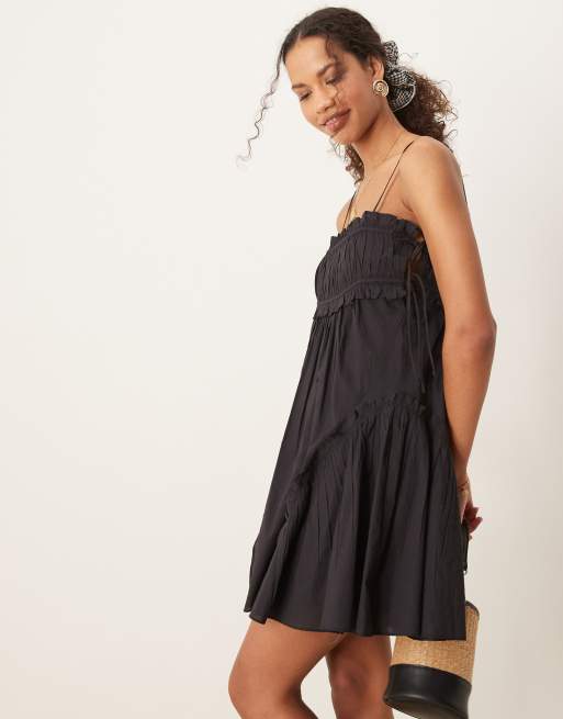 ASOS DESIGN babydoll mini dress with ruffle hem in black