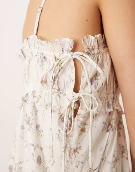 ASOS DESIGN babydoll mini dress with ruffle hem in ditsy floral print