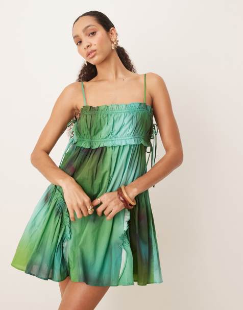 ASOS DESIGN babydoll mini dress with ruffle hem in green blurred print - view 1