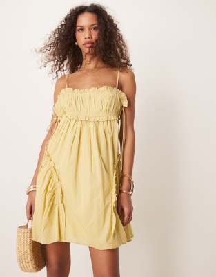 ASOS DESIGN babydoll mini dress with ruffle hem in green blurred print