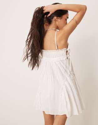 ASOS DESIGN babydoll mini dress with ruffle hem in white