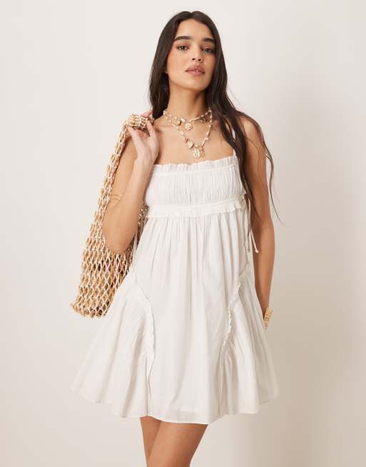 ASOS DESIGN babydoll mini sundress with ruffle hem in white, 3 of 4