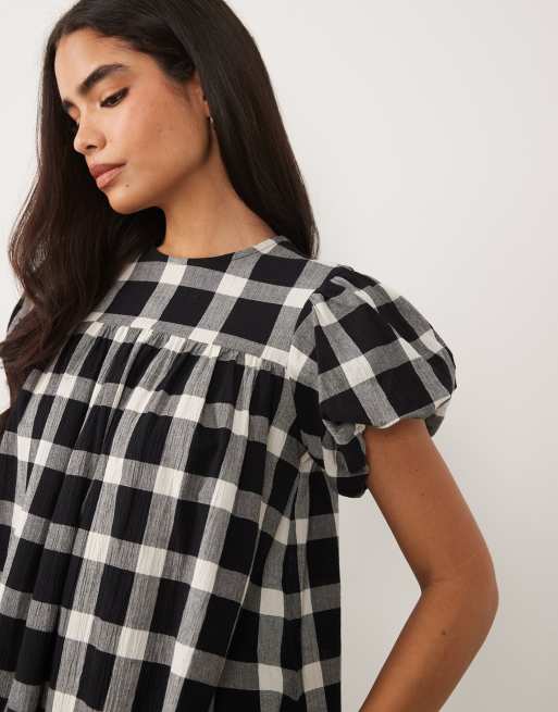 ASOS DESIGN – Babydoll-Minikleid in Schwarz-Weiß kariert mit Puffärmeln, 2 von 4