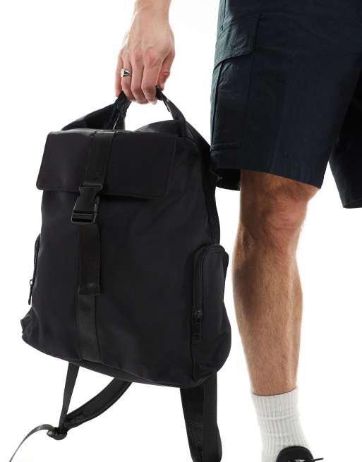 ASOS DESIGN backpack bag with front pocket and clasp closure in black ASOS