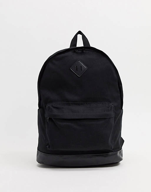 ASOS DESIGN backpack in black canvas and faux leather