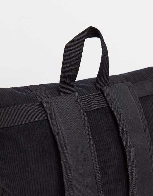 asos mini corduroy backpack ASOS DESIGN backpack in black corduroy with faux leather base