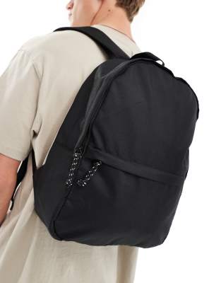 ASOS DESIGN ASOS DESIGN backpack in black nylon with contrast puller