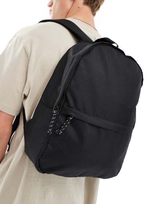 ASOS DESIGN backpack in black nylon with contrast puller