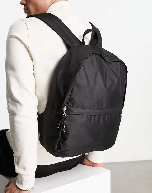 ASOS DESIGN - backpack in black nylon with contrast puller