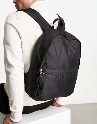 ASOS DESIGN backpack in black nylon with contrast zipper pull