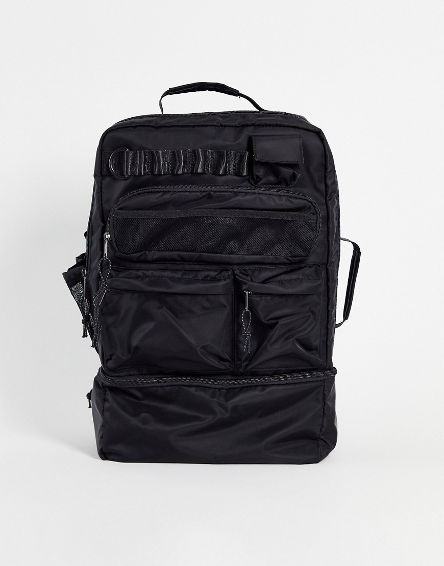 ASOS DESIGN backpack in black nylon with multi pockets and laptop compartment 30 Liters