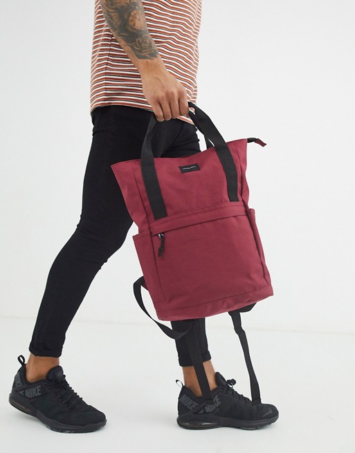 ASOS DESIGN backpack in burgundy with grab handle and branded patch