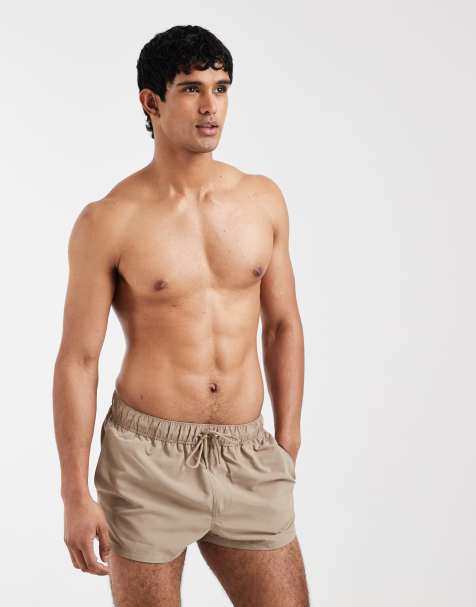 ASOS DESIGN – Badeshorts in Beige mit superkurzem Schnitt - view 1