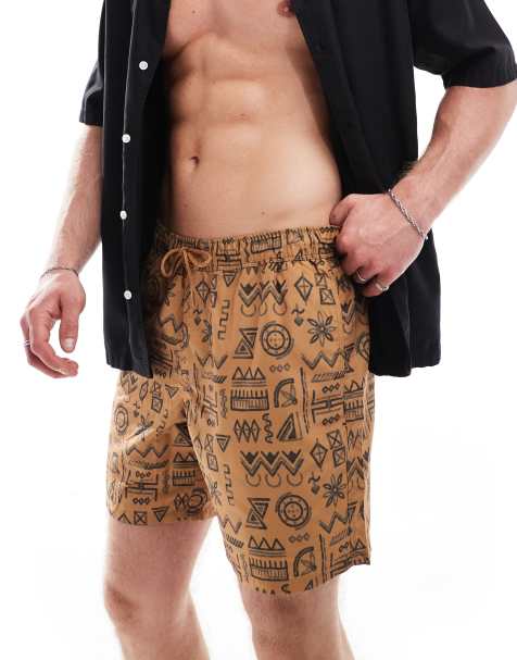 ASOS DESIGN – Badeshorts in mittlerer Länge in Braun mit geometrischem Muster - view 1