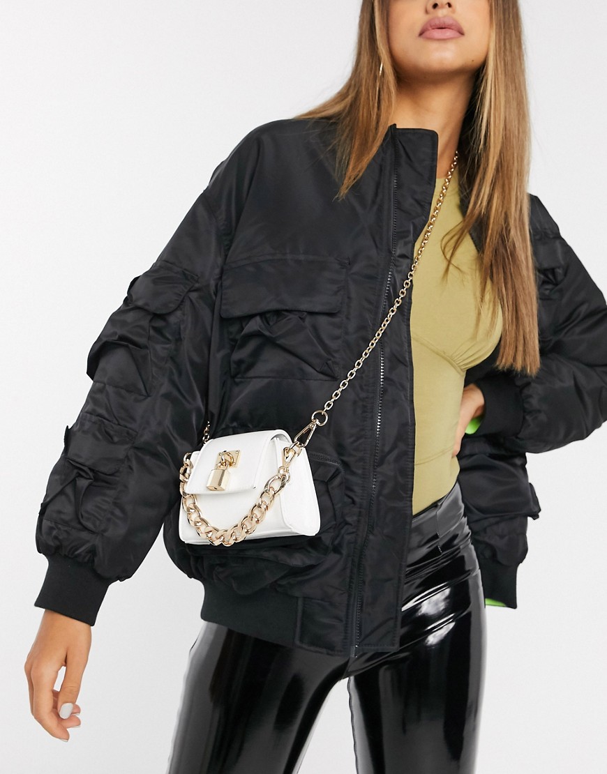 ASOS DESIGN bag with padlock detail and chunky chain in white patent