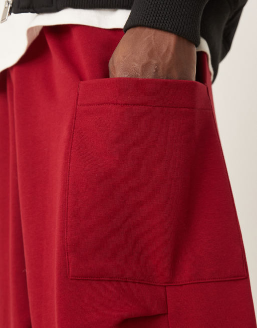 ASOS DESIGN baggy balloon cargo sweatpants in red | ASOS