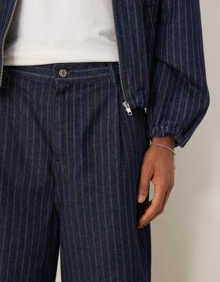 ASOS DESIGN baggy balloon jeans in mid wash blue with stripe