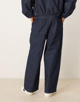 ASOS DESIGN baggy balloon jeans in mid wash blue with stripe