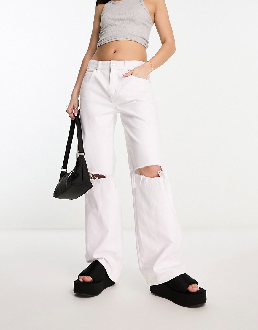Shop Asos Design Baggy Boyfriend Jeans In White With Knee Rips