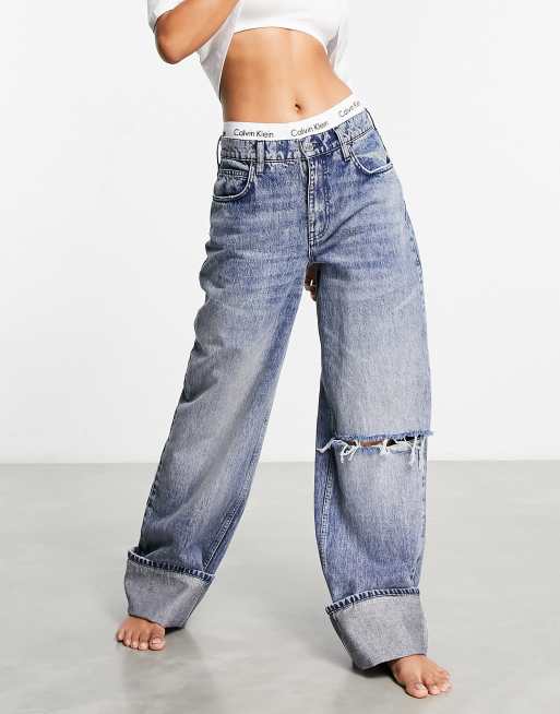 ASOS DESIGN baggy boyfriend jeans with knee rips and deep turn up