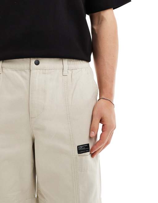 ASOS DESIGN baggy cargo pants with patch in stone, 3 of 5