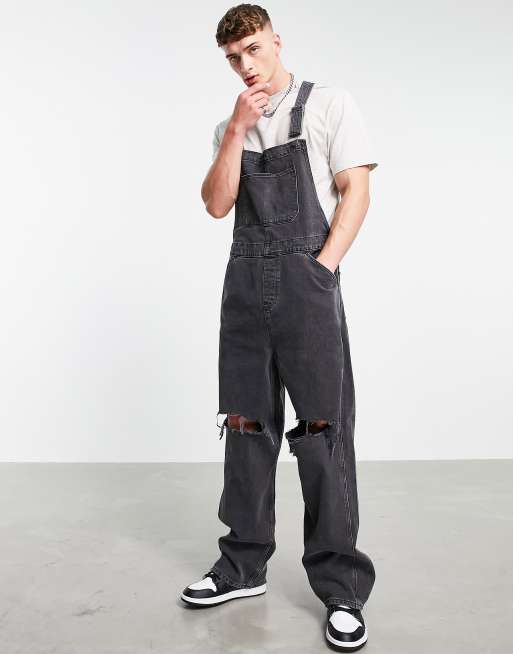 ASOS DESIGN baggy denim dungarees in washed black with knee rips