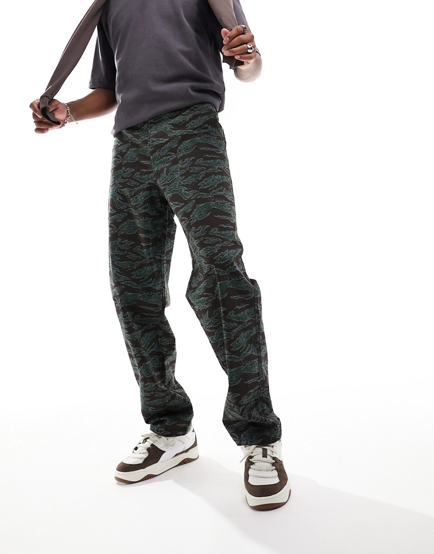 ASOS DESIGN baggy fit chino trouser in camo print-Green