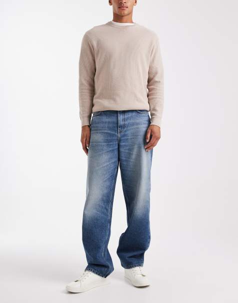 ASOS DESIGN baggy fit jeans in dark wash blue - view 1