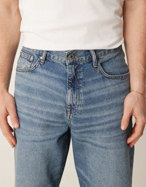 ASOS DESIGN baggy fit jeans in mid wash blue, 4 of 5