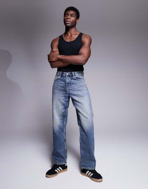 ASOS DESIGN baggy fit jeans with vintage tint in mid wash blue - view 1